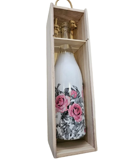 Wine box containing a bottle of sparkling wine